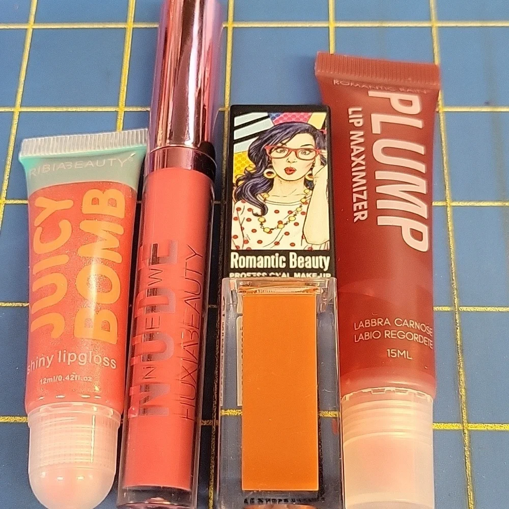 Lot of 4  Lip Gloss & Plumper New